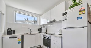 Kitchen - coffee machine, microwave, oven, toaster, kettle, fridge, dishwasher.