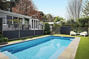 Hillside features an outdoor dining deck, overlooking an inviting pool