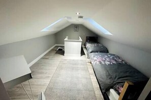 Loft with two single beds ! 