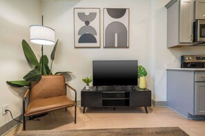 Living Room: An open-plan design with plenty of natural light and contemporary decor, making you feel right at home.