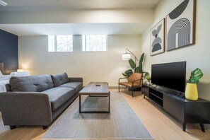 Living Room: Sink into a plush sofa after a day of exploring, with stylish decor and a welcoming ambiance.