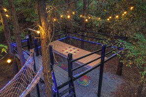 The kids can enjoy hours of entertainment on the playground in the back yard!