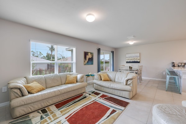 Living room with open concept with dining and kitchen island