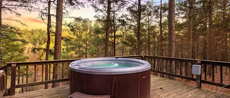 Slip into the hot tub and let the warm bubbles melt your stress away while surrounded by nothing but trees and tranquility.