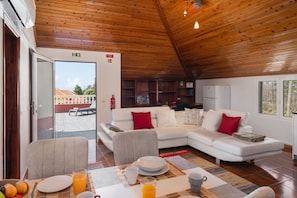 The Comfortable Living Area Of Prazeres Paradise Apartment By Ourmadeira And The Views To The Outside