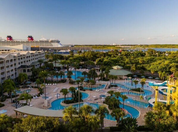 Main building with 2 outdoor pools and waterpark, lazy river