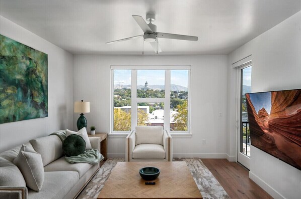 Stunning views of the Capitol, the mountains and the downtown skyline from the comfort of your top floor luxury space!