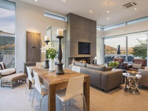 Master lounge area with high ceilings and lake views