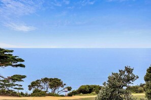Situated opposite the beach, this stunning residence combines the ultimate in modern living with panoramic ocean views stretching as far as the eye can see