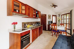 Views of kitchen and dining areas. A partial view of the fold down sofa sleeper.