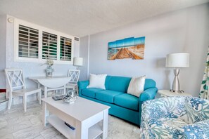 This living room is the perfect vacation day escape after a long day on the beach or catching the Myrtle Beach shows. This room has an eat-in kitchen, queen-sized sofa-sleeper, table for two, and seating for six.  Enjoy streaming your favorite shows.