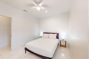 In this cozy bedroom, every night feels like a retreat, inviting you to unwind and drift off into peaceful dreams