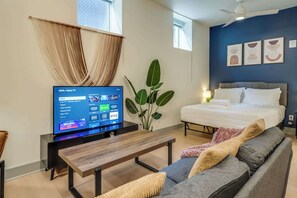 Modern studio unit with an open layout, ideal for both work and leisure.