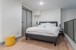 Thoughtfully arranged with a queen bed (bedroom space) and a spacious queen sofa bed (living space), ensuring a comfortable night’s sleep.