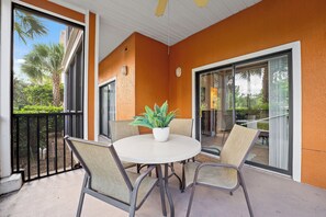 Dine al fresco or enjoy your morning coffee on the screened in patio
