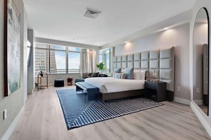 Bedroom 3 (King): Expansive master bedroom with king bed and en-suite bathroom