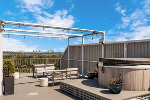 Your private rooftop with hot tub!