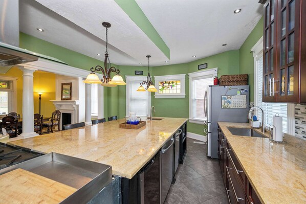 The kitchen is a chef’s dream, with loads of space & high-end amenities