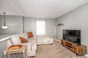 Curl up in the cozy living room & stream your favorite entertainment