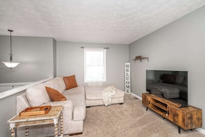 Curl up in the cozy living room & stream your favorite entertainment