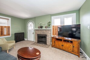 Living area with ample seating and Smart TV