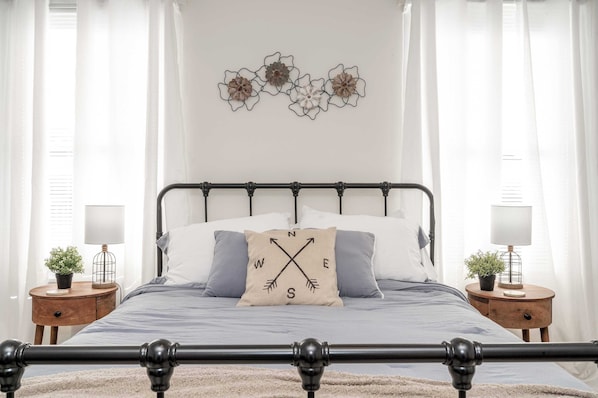 Apartment B’s bedroom sanctuary includes a comfy queen-sized bed