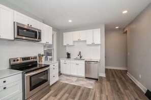 Apt 1 – The kitchen is spacious & well equipped for your visit to Covington