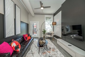 Lounge in style in the living room & stream your favorites on the smart TV