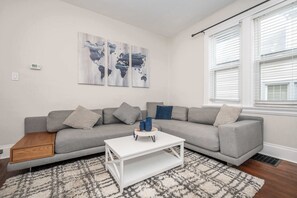 Curl up in the serene living room & stream all your favorite entertainment
