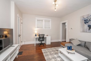 Curl up in the serene living room & stream all your favorite entertainment