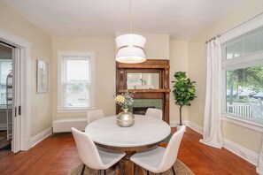 Off the entryway, find a charming dining area with table seating for 4