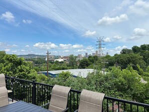 Enjoy a scenic view from the balcony overlooking lush greenery
