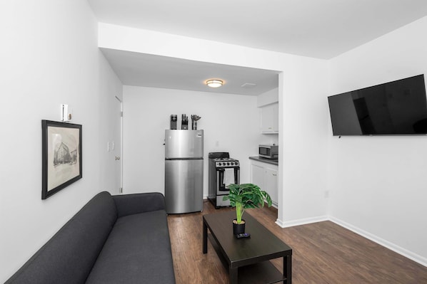 Curl up in the cozy living room & stream all your favorite entertainment
