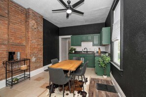 The chic kitchen offers loads of space & all the comforts of home