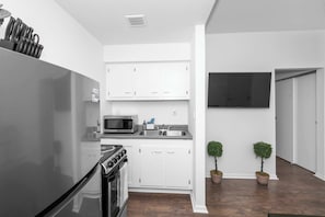 Craft culinary delights in the efficient and well-equipped kitchen