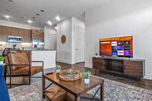 Once you enter the living room you'll find a space that feels both luxurious and cozy, perfect for unwinding after a long day.