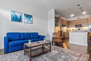 Once you enter the living room you'll find a space that feels both luxurious and cozy, perfect for unwinding after a long day.