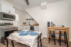 Gather for meals together at the dining table, seating 4