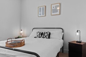 As you enter the bedroom, the sophisticated decor and plush bedding create a space where you can truly unwind.