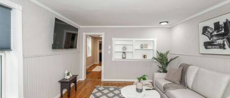 Curl up in the cozy living room & stream all your favorite entertainment