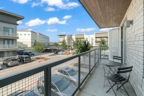 As you approach the house, the inviting entrance and beautiful exterior make you eager to explore what’s inside.
