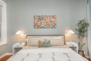 Unwind with your favorite streaming entertainment in the king-sized bed