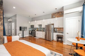 The sophisticated kitchen offers ample space & every home comfort
