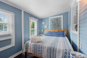 Recharge in the plush queen bed after a day exploring the area