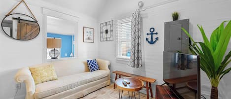 Curl up in the breezy living room & stream your favorites on the smart TV
