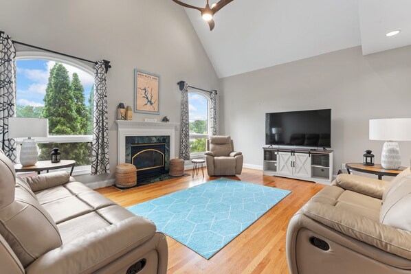 Curl up in the serene living room & stream all your favorite entertainment