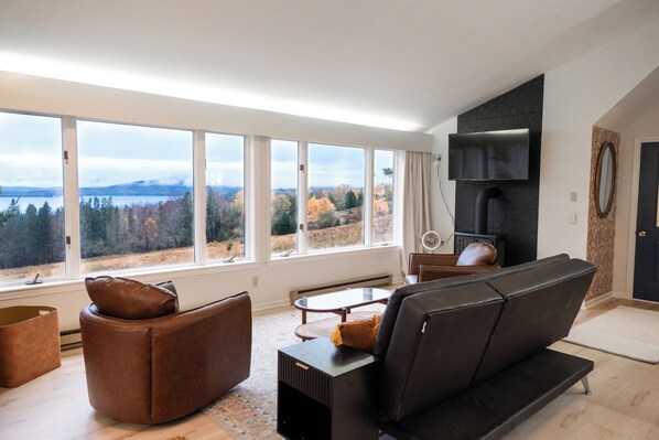 Wake up every morning to sweeping views of Rangeley lake