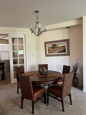Dining table for four (two additional seats at bar)
