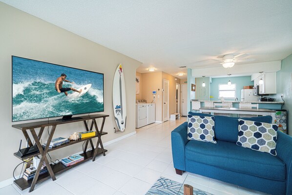 Curl up in the coastal living room & stream all your favorite entertainment