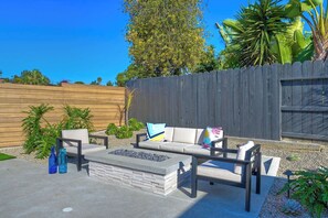 Gather around the firepit & make memories together during your stay